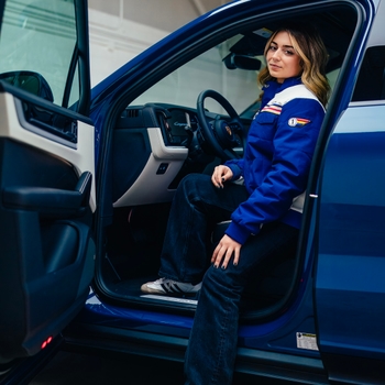 woman in Porsche