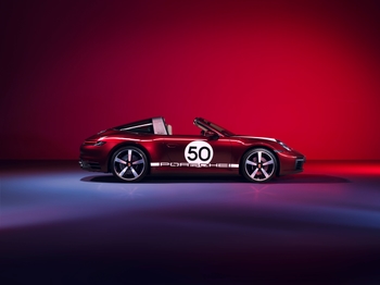 Side profile of 9111 in red blue ambient lighting. Heritage Design package