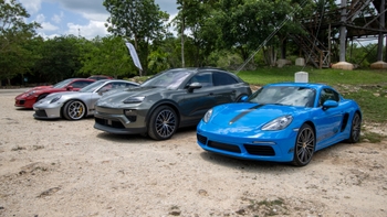 Porsche models parked one next to the other