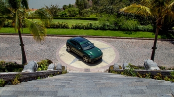 2025 Porsche Macan Turbo EV in Racing Green Metallic