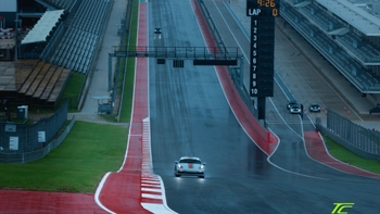 White Porsche GT3 on track