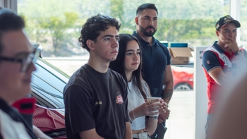 Porsche guests listening to a talk