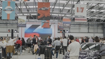 People enjoying the Le Mans Watching Party at the Porsche Centre Santa Fe