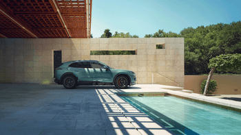 Porsche Cayenne parking next to swimming pool